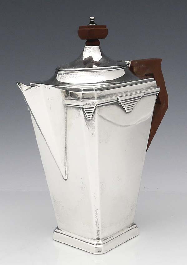 art deco lines on teapot from English silver teaset 1934